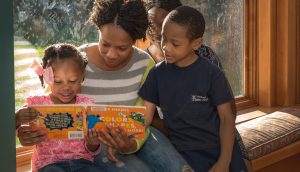 Children Reading with Parent