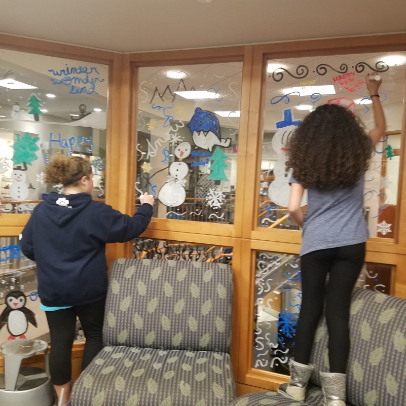 Teens Painting Windows in YA Room at Suffern Library