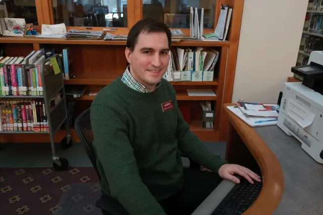 Andrew Nico Sitting at Computer at Suffern Free Library
